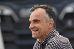Man in shirt looking to the left