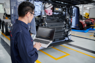 Service technician holding a laptop