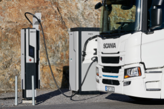 Electric truck being charged