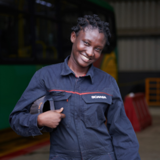 Female service technician posing in front of camera