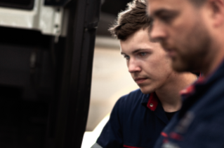 Close up shot of two service techniicans