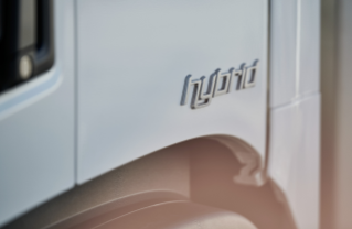Detailed view of hybrid marking on side of truck